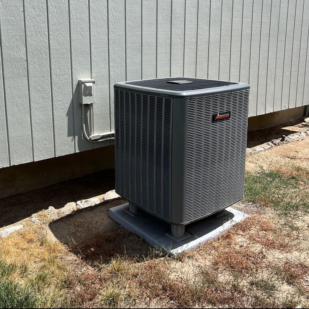 HVAC condenser unit outside a home